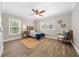 Charming bedroom with hardwood floors and a ceiling fan at 2704 Se 31St St, Ocala, FL 34471