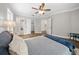 Spacious bedroom with walk-in closet and ceiling fan at 2704 Se 31St St, Ocala, FL 34471