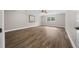 Large bedroom featuring wood-look floors and a ceiling fan at 2704 Se 31St St, Ocala, FL 34471