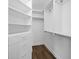 Spacious walk-in closet with ample shelving and hanging space at 2704 Se 31St St, Ocala, FL 34471