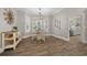 Bright dining area with wood flooring and a view to the kitchen at 2704 Se 31St St, Ocala, FL 34471