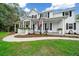 Two-story farmhouse with a wraparound porch at 2704 Se 31St St, Ocala, FL 34471