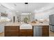Modern kitchen with a farmhouse sink and stainless steel appliances at 2704 Se 31St St, Ocala, FL 34471