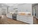 Large kitchen with white cabinets, granite countertops and stainless steel appliances at 2704 Se 31St St, Ocala, FL 34471