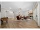 Spacious living room with fireplace and hardwood floors at 2704 Se 31St St, Ocala, FL 34471