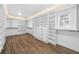 Spacious walk-in closet with ample shelving and drawers at 2704 Se 31St St, Ocala, FL 34471