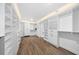 Spacious walk-in closet with ample shelving and drawers at 2704 Se 31St St, Ocala, FL 34471