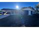 Newly painted house with carport and screened porch at 481 Spring Ln, Ocala, FL 34472