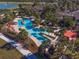 Large resort-style pool with multiple areas at 7066 Sw 91St Ct, Ocala, FL 34481