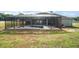 Property featuring a large pool and screened enclosure at 7403 Ne 22Nd Court Rd, Ocala, FL 34479