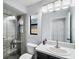 Bathroom with shower, toilet, and single vanity at 7403 Ne 22Nd Court Rd, Ocala, FL 34479