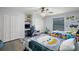 bedroom with twin beds, built-in desk and ample closet space at 7403 Ne 22Nd Court Rd, Ocala, FL 34479