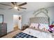 Bright bedroom with a plush bed and plenty of closet space at 7403 Ne 22Nd Court Rd, Ocala, FL 34479