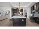 Modern kitchen with large island and stainless steel appliances at 7403 Ne 22Nd Court Rd, Ocala, FL 34479