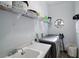 Laundry room with washer, dryer, and shelving at 7403 Ne 22Nd Court Rd, Ocala, FL 34479