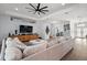 Spacious living area with sectional sofa and hardwood floors, open concept at 7403 Ne 22Nd Court Rd, Ocala, FL 34479