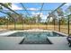 Inviting screened pool with ample deck space at 7403 Ne 22Nd Court Rd, Ocala, FL 34479