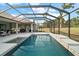 Screened pool and spa with spacious patio area at 7403 Ne 22Nd Court Rd, Ocala, FL 34479