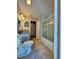 Bathroom features a shower/tub, tile floor, and vanity at 7535 Sw 185 Avenue Rd, Dunnellon, FL 34432