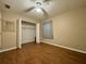 Bright bedroom with wood-look floors and spacious closet at 7535 Sw 185 Avenue Rd, Dunnellon, FL 34432