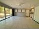 Bonus room features tile floors, cabinets, and exterior access at 7535 Sw 185 Avenue Rd, Dunnellon, FL 34432