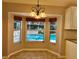 Bright dining area overlooking the pool at 7535 Sw 185 Avenue Rd, Dunnellon, FL 34432
