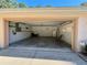 Attached garage with extra storage space and shelving at 7535 Sw 185 Avenue Rd, Dunnellon, FL 34432