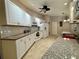 Kitchen with granite countertops and white cabinets at 7535 Sw 185 Avenue Rd, Dunnellon, FL 34432