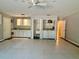 Laundry area with washer, dryer, utility sink, and cabinets at 7535 Sw 185 Avenue Rd, Dunnellon, FL 34432