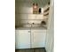 Stackable washer and dryer in a well-lit laundry closet at 7535 Sw 185 Avenue Rd, Dunnellon, FL 34432