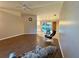 Open living and dining area with hardwood floors and a view of the kitchen at 7535 Sw 185 Avenue Rd, Dunnellon, FL 34432