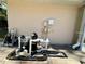 Pool pump and filter system neatly organized in dedicated space at 7535 Sw 185 Avenue Rd, Dunnellon, FL 34432