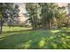 Spacious backyard with golf course views and lush landscaping at 8725 Nw 31St Lane Rd, Ocala, FL 34482