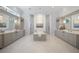 Large Primary bathroom with double vanities, soaking tub, and walk-in shower at 8725 Nw 31St Lane Rd, Ocala, FL 34482