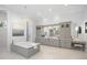 Luxurious Primary bathroom with double vanity, soaking tub, and ample storage at 8725 Nw 31St Lane Rd, Ocala, FL 34482