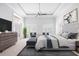 Main bedroom with king bed and access to private balcony at 8725 Nw 31St Lane Rd, Ocala, FL 34482