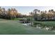 Picturesque golf course with stone bridge and water feature at 8725 Nw 31St Lane Rd, Ocala, FL 34482