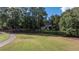 Luxury home nestled in a wooded golf course community at 8725 Nw 31St Lane Rd, Ocala, FL 34482