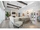 Open concept living area with hardwood floors and a view of the kitchen at 8725 Nw 31St Lane Rd, Ocala, FL 34482