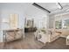 Open living space featuring a sectional sofa, fireplace, and built-in shelving at 8725 Nw 31St Lane Rd, Ocala, FL 34482