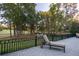 Relaxing patio with golf course views and chaise lounge at 8725 Nw 31St Lane Rd, Ocala, FL 34482