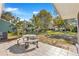 Relaxing backyard patio with a picnic table, ideal for outdoor entertaining at 10962 Sw 81St Ave, Ocala, FL 34481