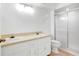Bathroom with double sinks, shower, and tile flooring at 10962 Sw 81St Ave, Ocala, FL 34481