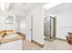 Main bathroom with double vanity and shower at 10962 Sw 81St Ave, Ocala, FL 34481