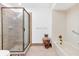 Bathroom with shower, tub and decorative vase at 10962 Sw 81St Ave, Ocala, FL 34481