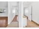 Hallway with tile flooring and access to bedrooms at 10962 Sw 81St Ave, Ocala, FL 34481