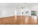 Large living room with hardwood floors and lots of natural light at 10962 Sw 81St Ave, Ocala, FL 34481