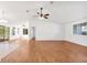 Open living room with hardwood floors and high ceilings at 10962 Sw 81St Ave, Ocala, FL 34481