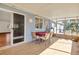 Enjoy this spacious screened porch, perfect for relaxing or dining al fresco at 10962 Sw 81St Ave, Ocala, FL 34481
