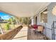 Bright and airy screened porch with seating area and view of backyard at 10962 Sw 81St Ave, Ocala, FL 34481